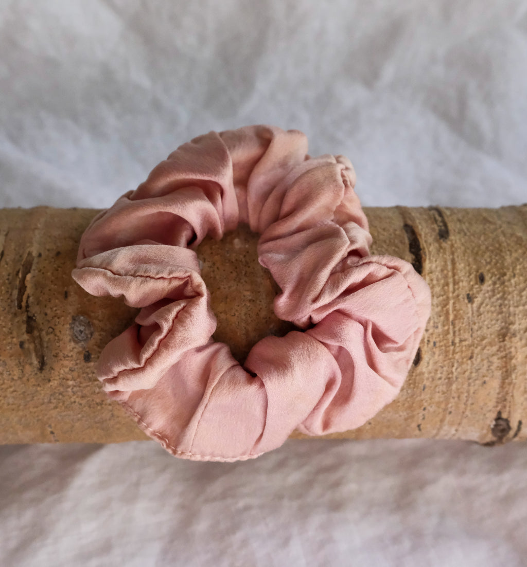 soft lilac on a wooden stick with a soft white background
