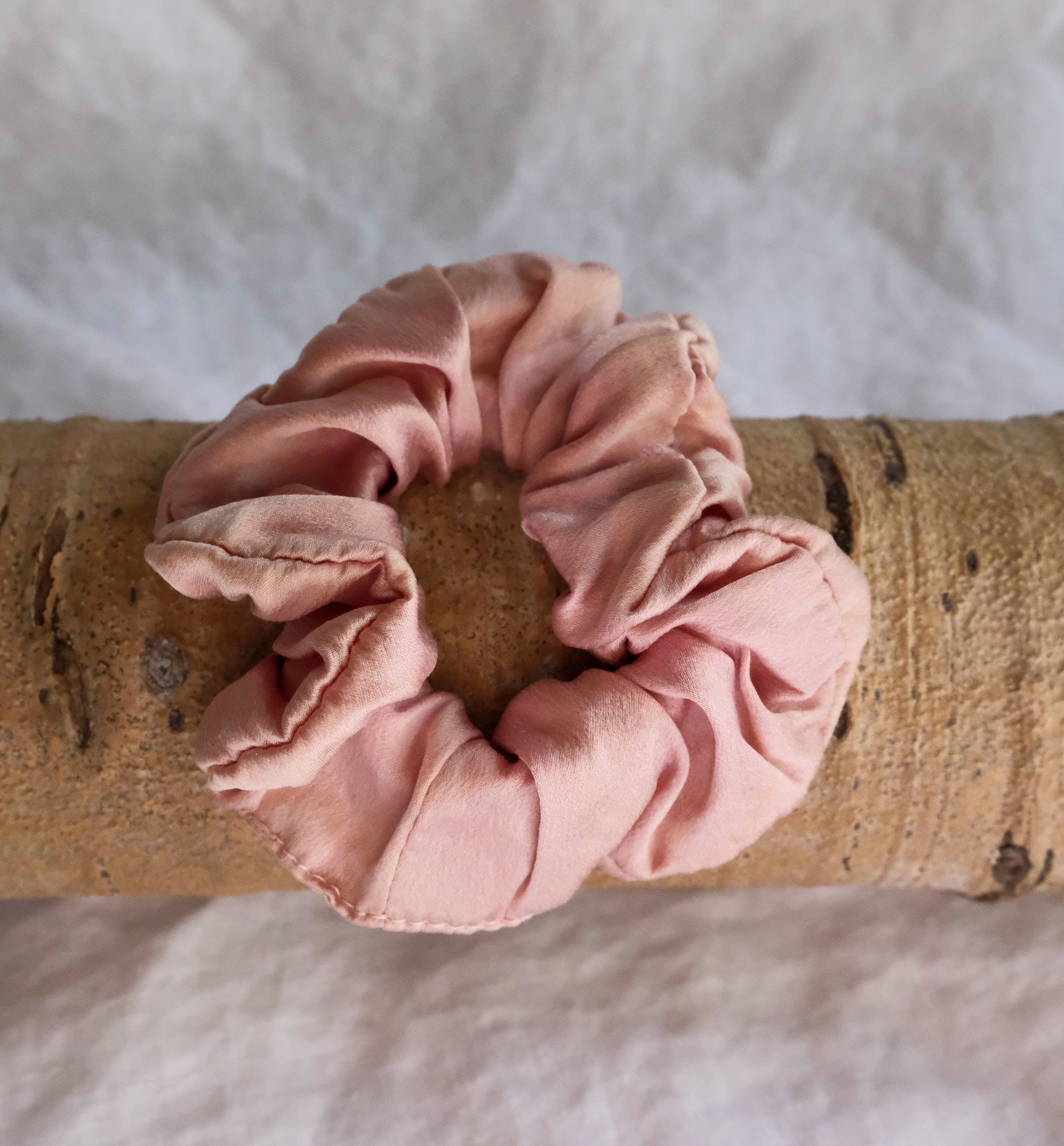 soft lilac on a wooden stick with a soft white background